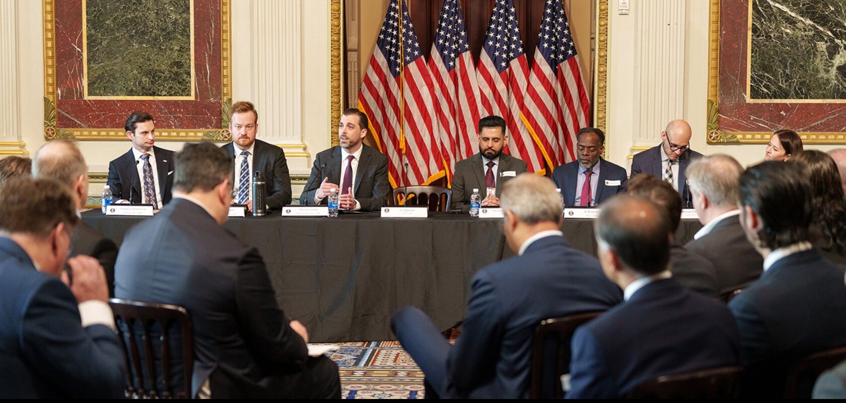 Senior government officials from the Office of the Federal Information Officer, National Security Council, Department of Homeland Security, Department of Justice, Department of State, and Office of the National Cyber Director leading the discussion during the Convening on Artificial Intelligence for Cyber Defense Optimization on Wednesday, March 11, 2026, at the Indian Treaty Room. Official White House Photo by Nick Moore.